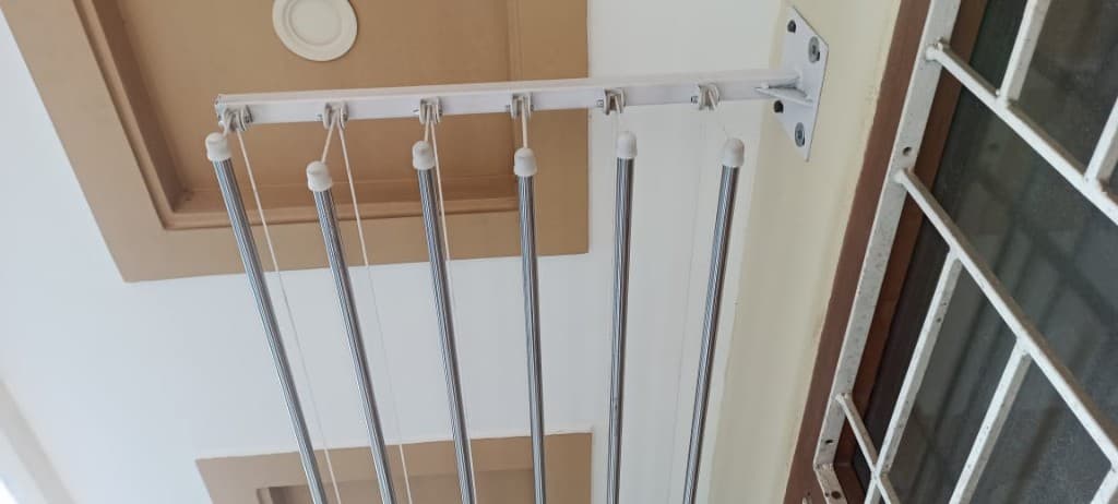 Wall Mounted Cloth Dry Hangers 6 Feet 6 Rods Set — wall mounted installed view